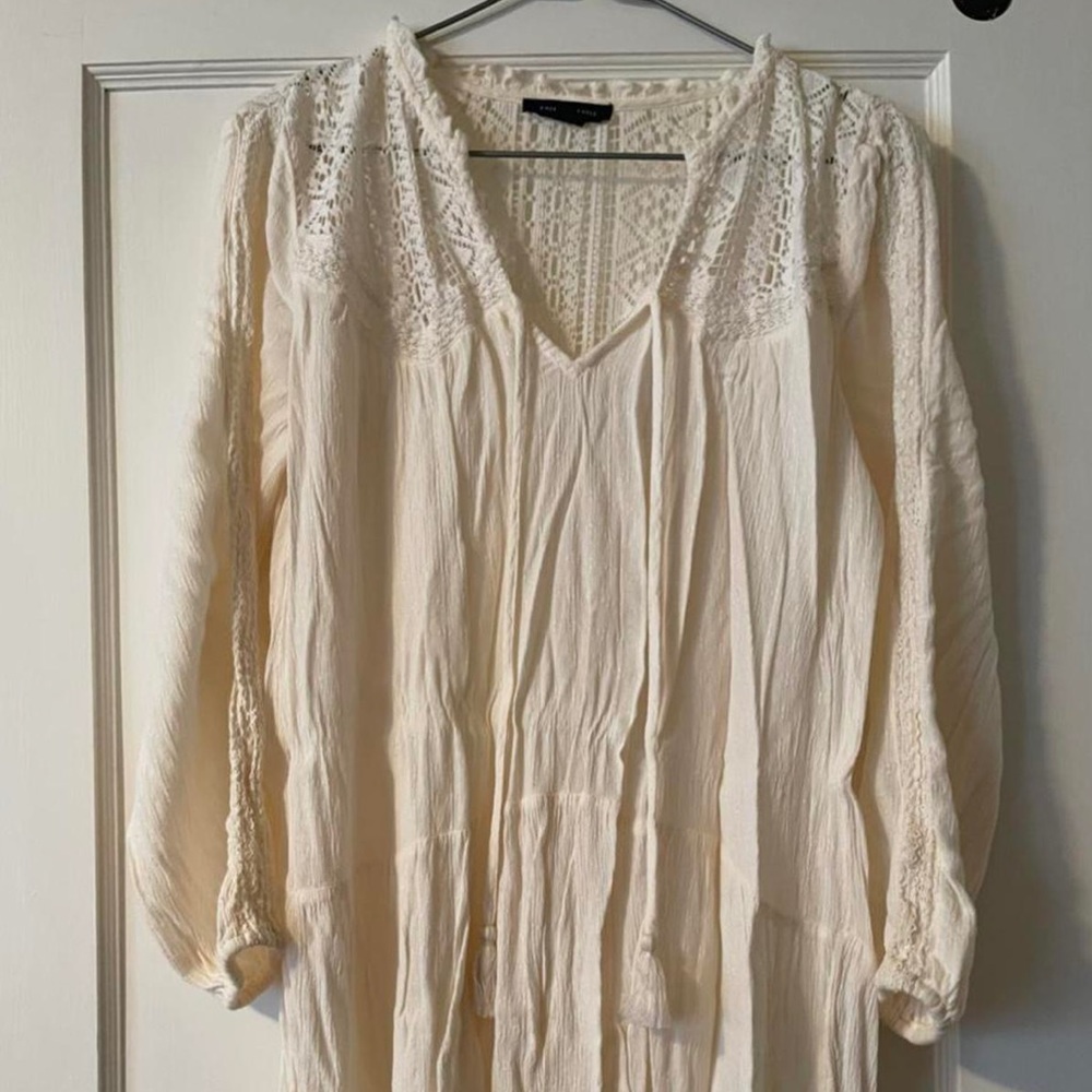 cream coloured v neck blouse from american eagle.